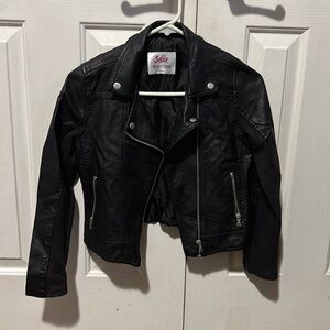 Brand is Justice, size 12. Color is Black.